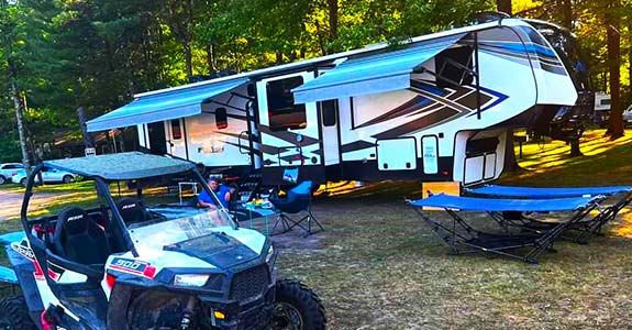 Seasonal camp sites in Big Flats Wisconsin at Pineland Camping Park with access to ATV and UTV trails