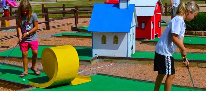 Kids mini golf at the clubhouse at Pineland Camping Park in Big Flats WI
